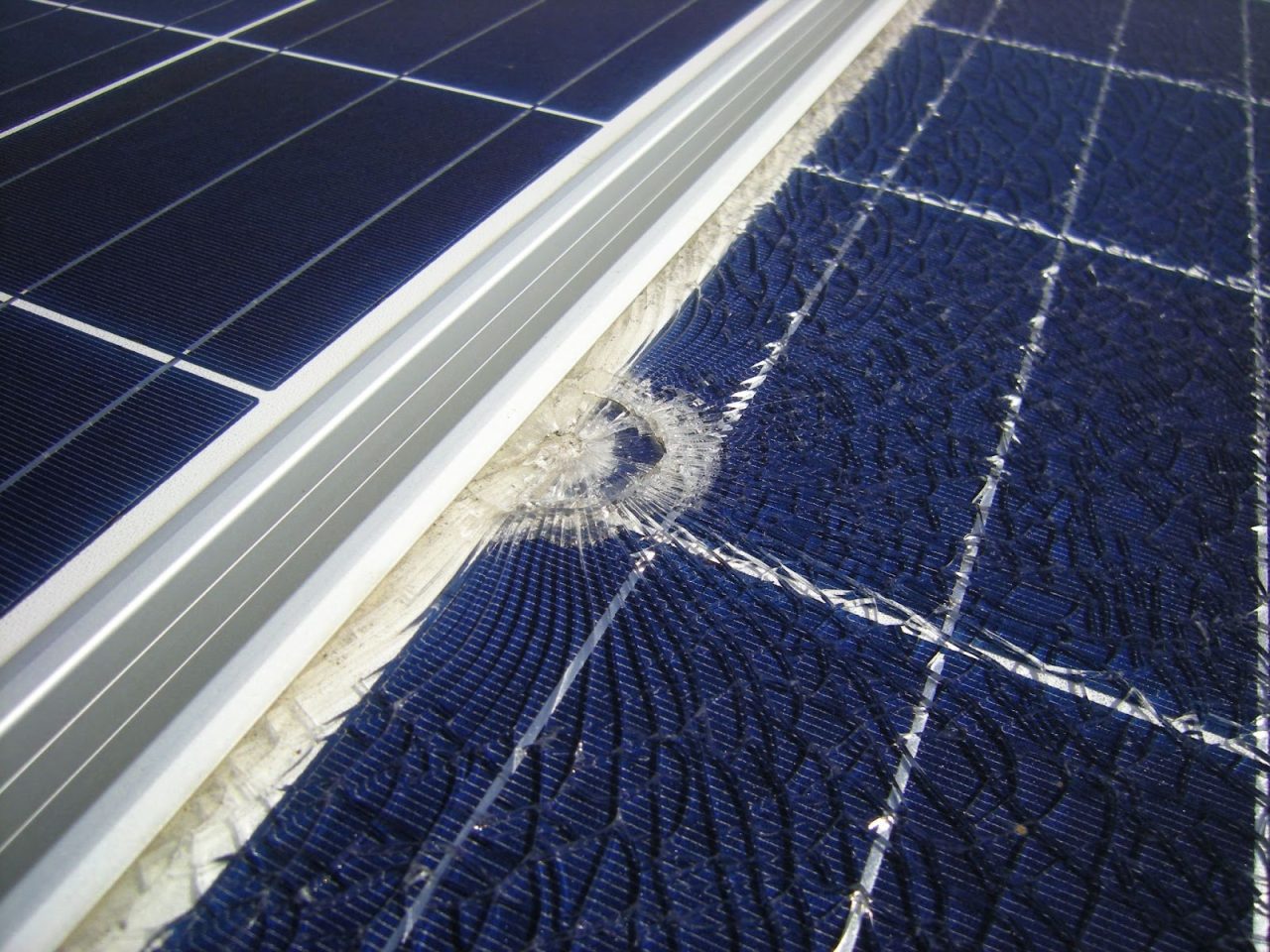 Cracked solar panel on roof